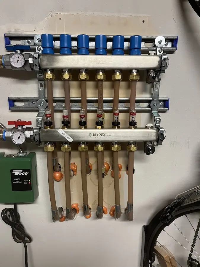 Plumber performing Water Heater Repair at a residential property in Montvale